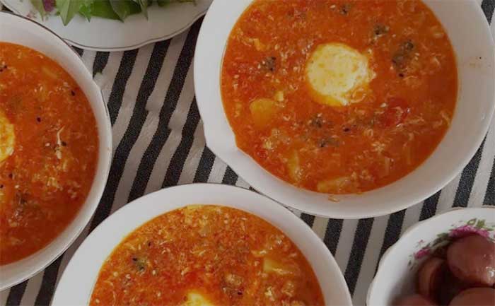 اشکنه گوجه خراسانی با لپه و سبزیجات معطر